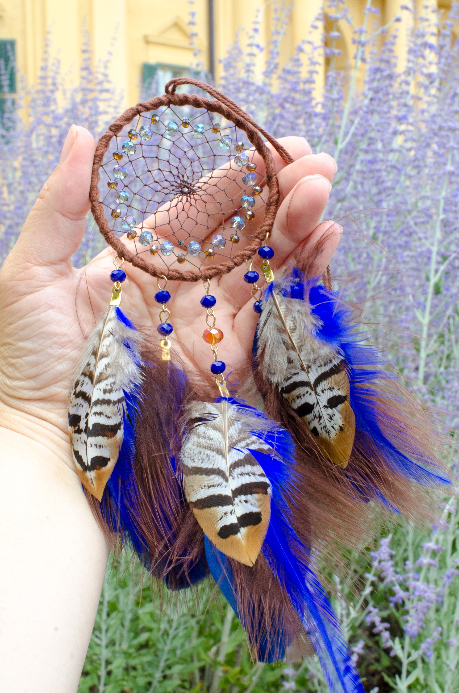 Small dreamcatcher with brown and blue feathers - car rearview mirror size